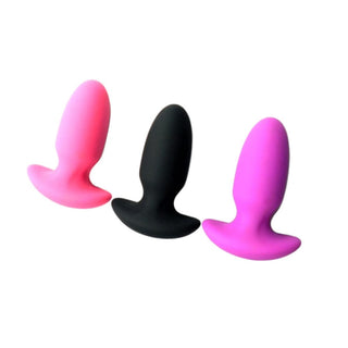 You are looking at an image of Colored Hollow Silicone Vibrating Plug in black color, 4.13 inches long.