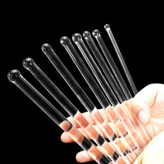 What you see is an image of 8-Piece Smooth Glass Urethral Sounds set showcasing various sizes of glass rods for urethral play.