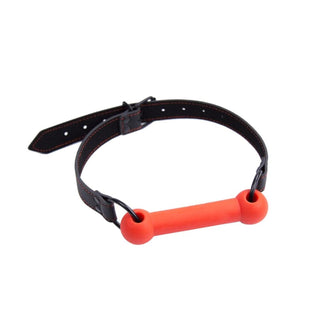 Body-safe silicone Bone-Shaped Gag in black and red colors for adventurous nights.