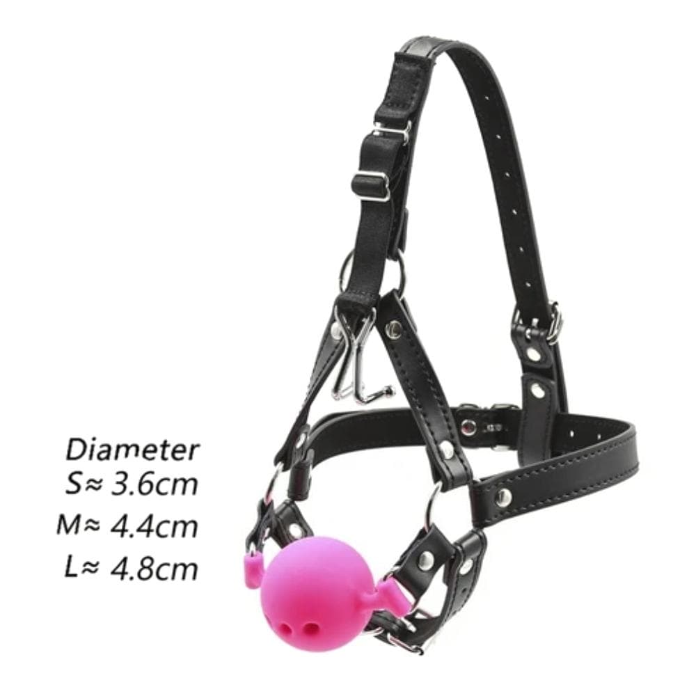 This is an image of Punishment Fetish Wiffle Gag Ball size medium with adjustable straps and metal nose hooks for stability.