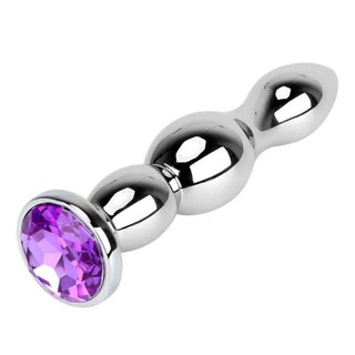 Feast your eyes on an image of the stainless steel plug with a jewel at the end, inviting you to explore new depths of pleasure and sensual bliss.