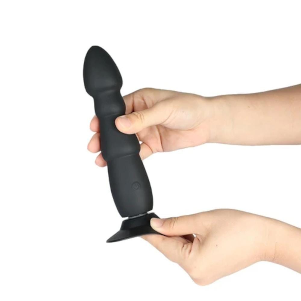 Displaying an image of the sleek and bulbous head of the prostate massager for deep stimulation.
