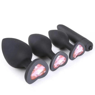 Presenting an image of Silicone Princess Anal Training Kit with Extra Vibrator 4pcs set, with a jewel base made from acrylic crystal for added glam.