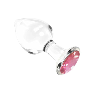 This is an image of Jeweled Glass Anal Training Set of 4 showcasing the varying lengths and sizes of the plugs, ranging from 3.15 to 3.9 inches, each designed for a unique experience.