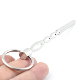Feast your eyes on an image of Solid Stainless Beginner Prince Penis Plug made from premium stainless steel with a tapered tip for easy insertion and attached ring for secure use.