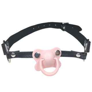 Image of Adult Baby Gag with adjustable strap and white pacifier, perfect for wild play.