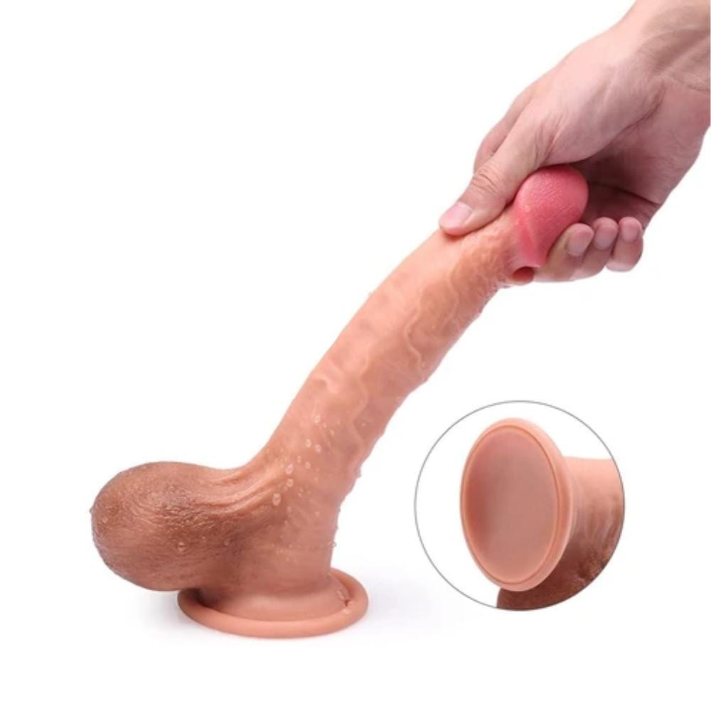 Here is an image of Lifelike King Sized 9 Inch Realistic Skin Dildo, displaying a suction cup base for hands-free riding on smooth surfaces.