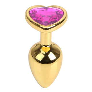 Presenting an image of Heart-Shaped Jewel Stainless Steel Gold Pretty Plug 2.76 Inches Long featuring a heart-shaped jewel and flared base for safety.