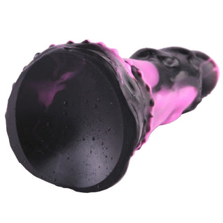 Check out an image of a purple basilisk dildo with strong suction cup for hands-free play.