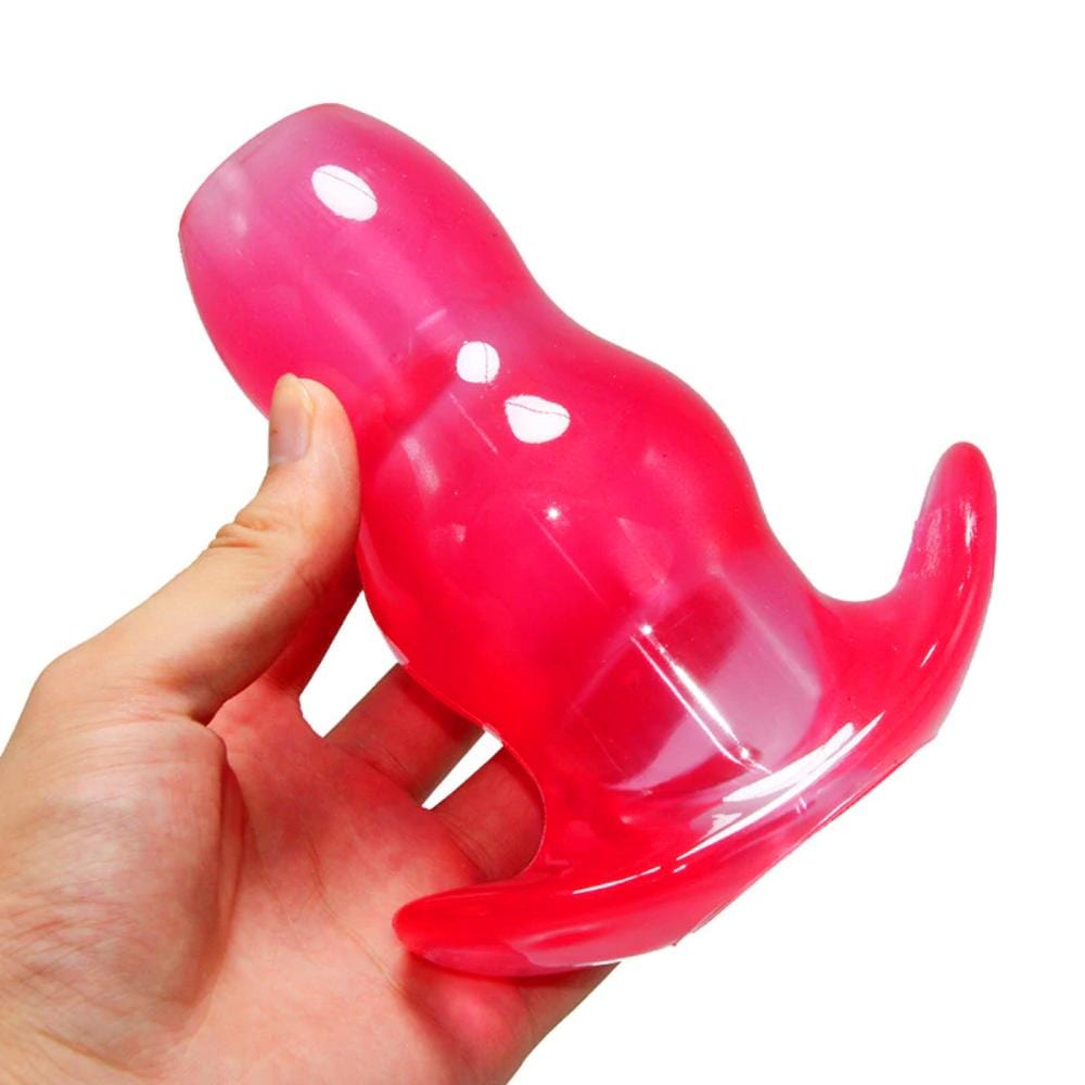 Featuring an image of Take-A-Peek Silicone Hollow Plug with unique hollow design for easy lubrication and enhanced stimulation.