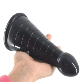 Displaying an image of the Big Bad Cone-Shaped Anal Plug in flesh color, designed for intense pleasure with a tapered bulb tip for easy insertion.