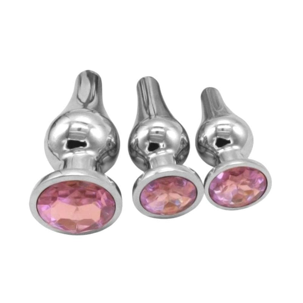 Displaying an image of Cute Pear-Shaped Steel Jeweled 3pcs Training Kit displaying the colorful acrylic crystal handle and the luxurious feel of the polished steel plugs.