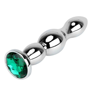 This image displays the green gemstone on the stainless steel plug, highlighting the comfort and durability of the material.