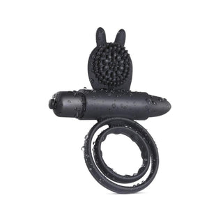 Displaying an image of Vibrating Clit-Friendly Dual Cock Ring with a focus on the rabbit head design and embedded nubs