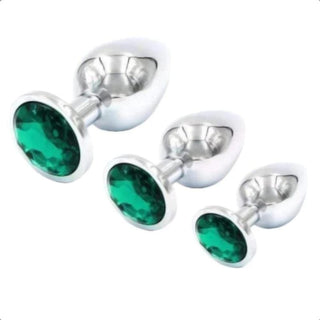 In the photograph, you can see an image of a luxurious jewel butt plug set in various vibrant colors.