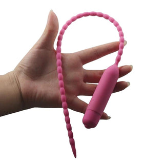 This is an image of a flexible silicone plug designed for comfort and safety