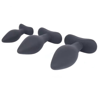 Take a look at an image of Black Silicone Plug Training Set For Men, 3-Pieces with tapered tips for easy insertion.
