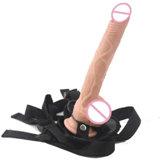 Displaying an image of Pegging Adventure 9 Inch Dildo With Strap On Harness in flesh color