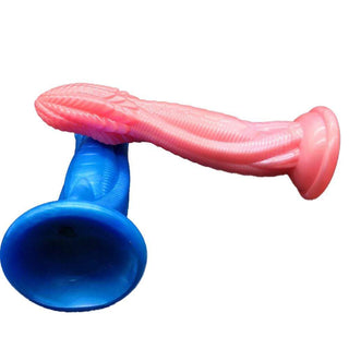 A picture of the dragon dildo in pink color, featuring a curved shaft for G-spot or prostate stimulation.