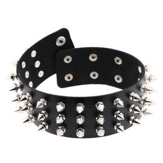 This is an image of Badass Spiked Gothic-Themed Collar with menacing spikes on sleek black PU leather.