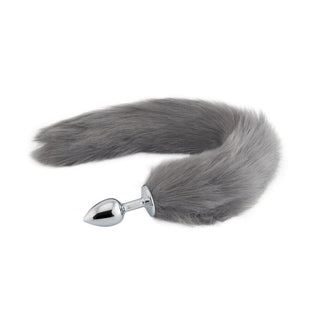 This is an image of Frosty Gray Wolf Tail Plug, a luxurious intimate toy with a stainless steel plug and synthetic fur tail for ultimate pleasure.