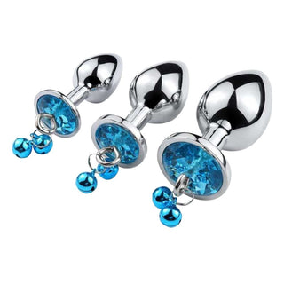 Here is an image of Dangling Jeweled Bell Princess Anal Trainer Set, 3-Piece showcasing high-quality metal plugs with smooth texture and temperature-responsive nature.
