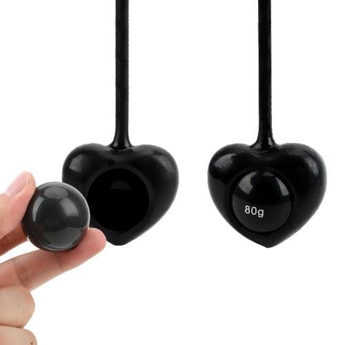 Featuring an image of Heart-Shaped Penis Weight Hanging Toy Set in black color made from silicone and TPE materials.