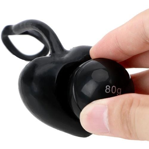 In the photograph, you can see an image of Heart-Shaped Penis Weight Hanging Toy Set with weights ranging from 0.13 lbs to 0.26 lbs for gradual progression.