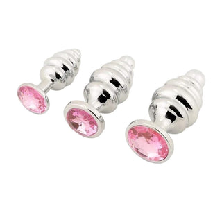 Three-piece set of anal plugs crafted for comfort and delight, offering a luxurious experience with top-tier stainless steel.