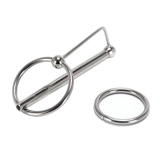 Take a look at an image of Pleasure Ring Sperm Stopper, a stainless steel urethral plug with interchangeable rings.