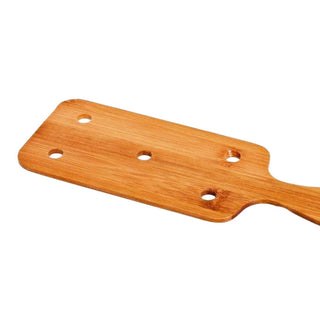 This is an image of Impact Play BDSM Bamboo Wood Paddle Sex, a precise and versatile paddle made from high-quality bamboo.