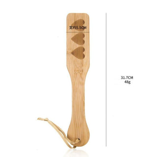 Experience enhanced pleasure and intimacy with every strike of this wooden paddle.