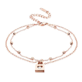 What you see is an image of Trendy Locking Anklets with AAA Cubic Zirconia and Rhinestone accents in rose gold plating.