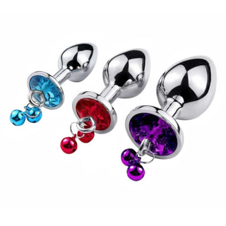 Featuring an image of Dangling Jeweled Bell Princess Anal Trainer Set, 3-Piece featuring small, medium, and large plugs with tear-drop shapes and dangling colored bells.