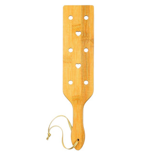 This is an image of Pain Giver BDSM Wooden Paddle With Holes, designed for a thrilling blend of pain and pleasure.