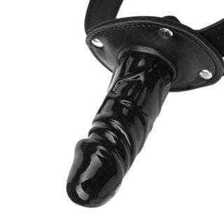 A picture of Slaves Face Strapon with dimensions of 3.94 in length for the dildo and 25.98 for the harness.