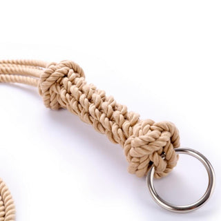 This is an image of Handmade Whip Shibari Rope, a tool to reignite passion and rediscover excitement in intimate play.