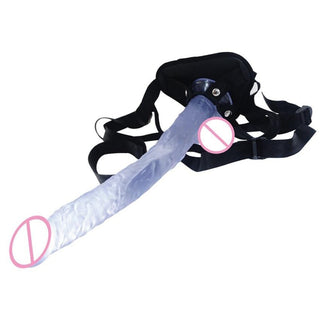 Here is an image of Extreme Pegging Transparent 10 Inch to 15-Inch Long Strap On with flared base and suction cup for versatile play options.