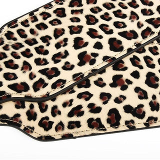 Discover the primal allure and wild side of pleasure with this leopard-printed spanking paddle.