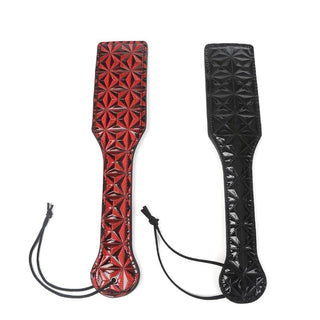 Featuring an image of Chic High-End Slapper Leather Sex Paddle with dual-sided design for gentle or intense sensations.