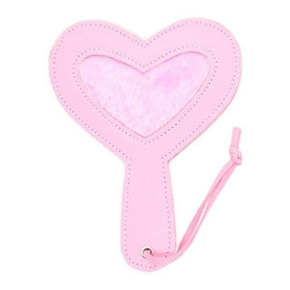 This is an image of Charming Slap Kink Plushy Heart Sex Paddle in playful pink color with plush material and PU leather lining.