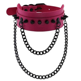 Observe an image of Spiked Trendy Goth Choker in green, adding a tantalizing touch to your attire with its sleek design.