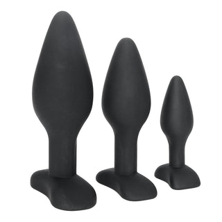Presenting an image of small, medium, and large butt plugs with pointed tips for easy insertion and seductive stretch.