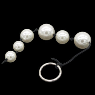 Check out an image of Glossy Pearl Anal Beads with varied sizes of beads from 1.18 inches to 0.79 inch on a sturdy nylon string.