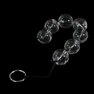 A visual representation of the metal loop attached to Clear Orbs Glass Anal Balls for complete control.