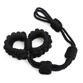 Pictured here is an image of Versatile Adjustable Nylon Bondage Play Rope Handcuffs with 17.72 inches length and secure wrist cuff for comfortable restraint.