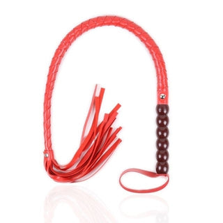 Observe an image of Fiendish Seduction Sex Whip, a devilishly enticing tool with braided red synthetic leather strands for seduction and dominance.