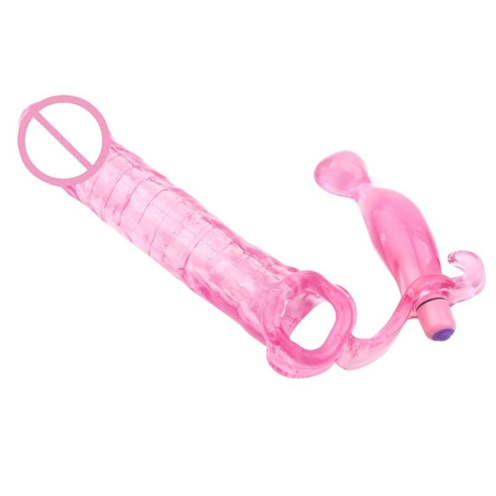 You are looking at an image of Pink Stuffer Huge Cock Sleeve, a ribbed penis sleeve with a vibrating plug for intensified pleasure.