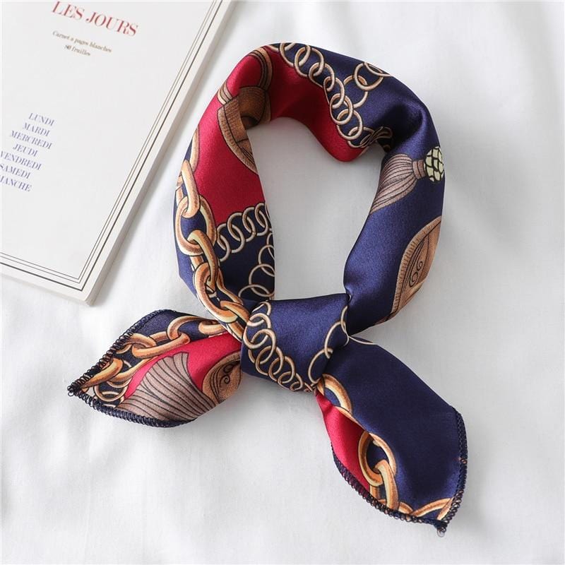 Displaying an image of Printed Satin Scarf Knotted Gag in vibrant multi-colored design.