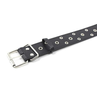 Image showing the sleek and sophisticated black collar with edgy rivet eyelet studs for versatility.